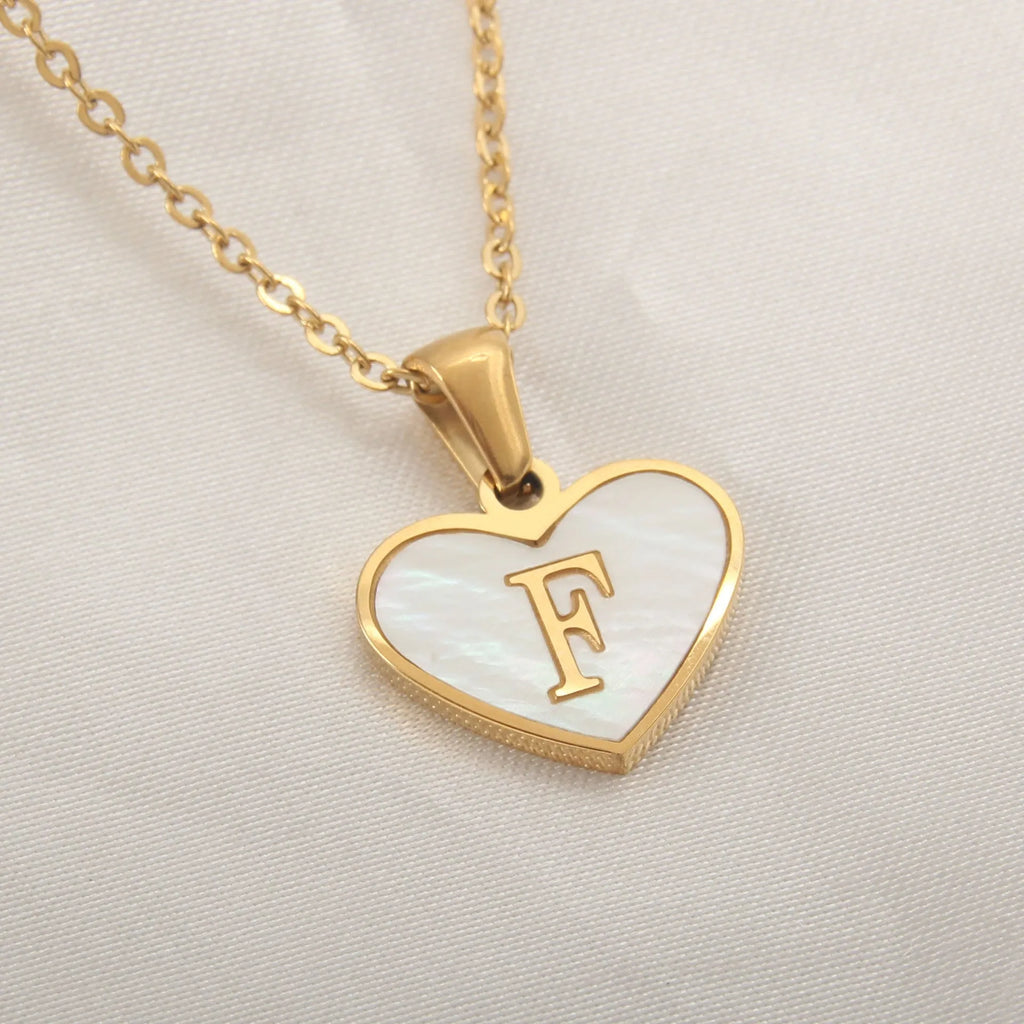 Gold plated personalised heart necklace with white shell on a 45cm chain