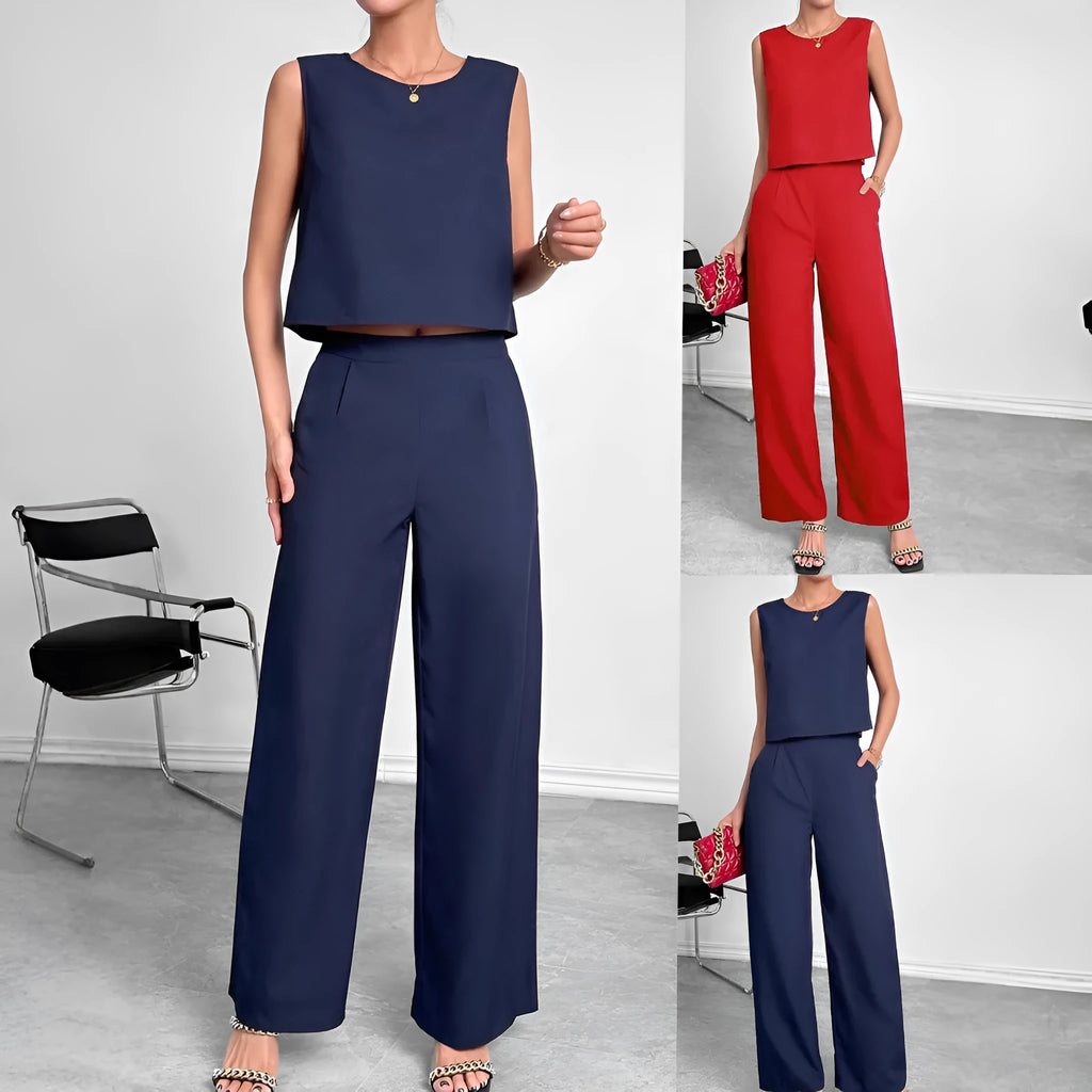 Women's red polyester two-piece set with sleeveless top and wide leg trousers displayed flat