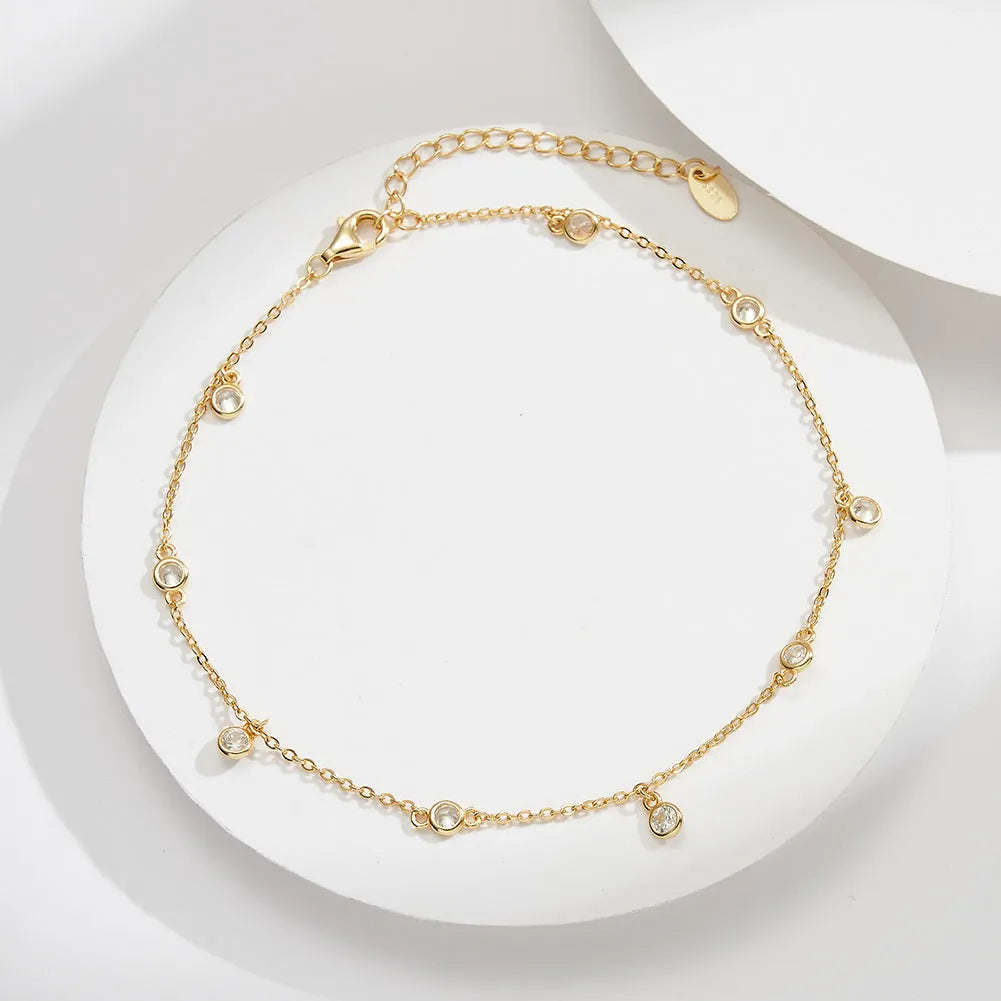 Women's silver anklet with geometric zirconium pendant in gold plating option