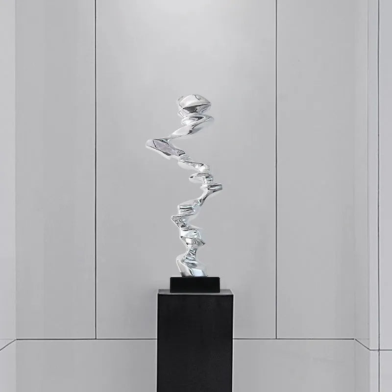 Abstract still life sculpture in Ran Ran Rose bright gold, elegant silver, or phantom blue.