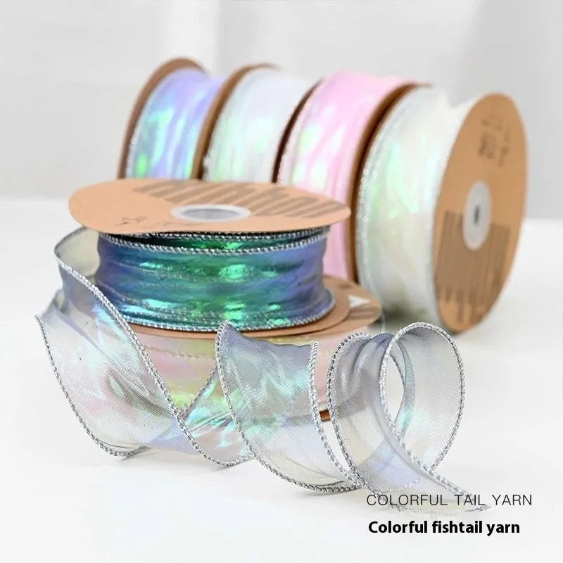 Roll of colourful mesh wave ribbon with fishtail yarn texture in 4cm width