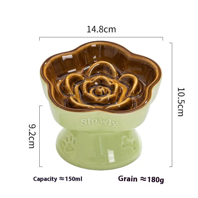 A white ceramic pet bowl with a high foot and raised neck protector to prevent tipping.