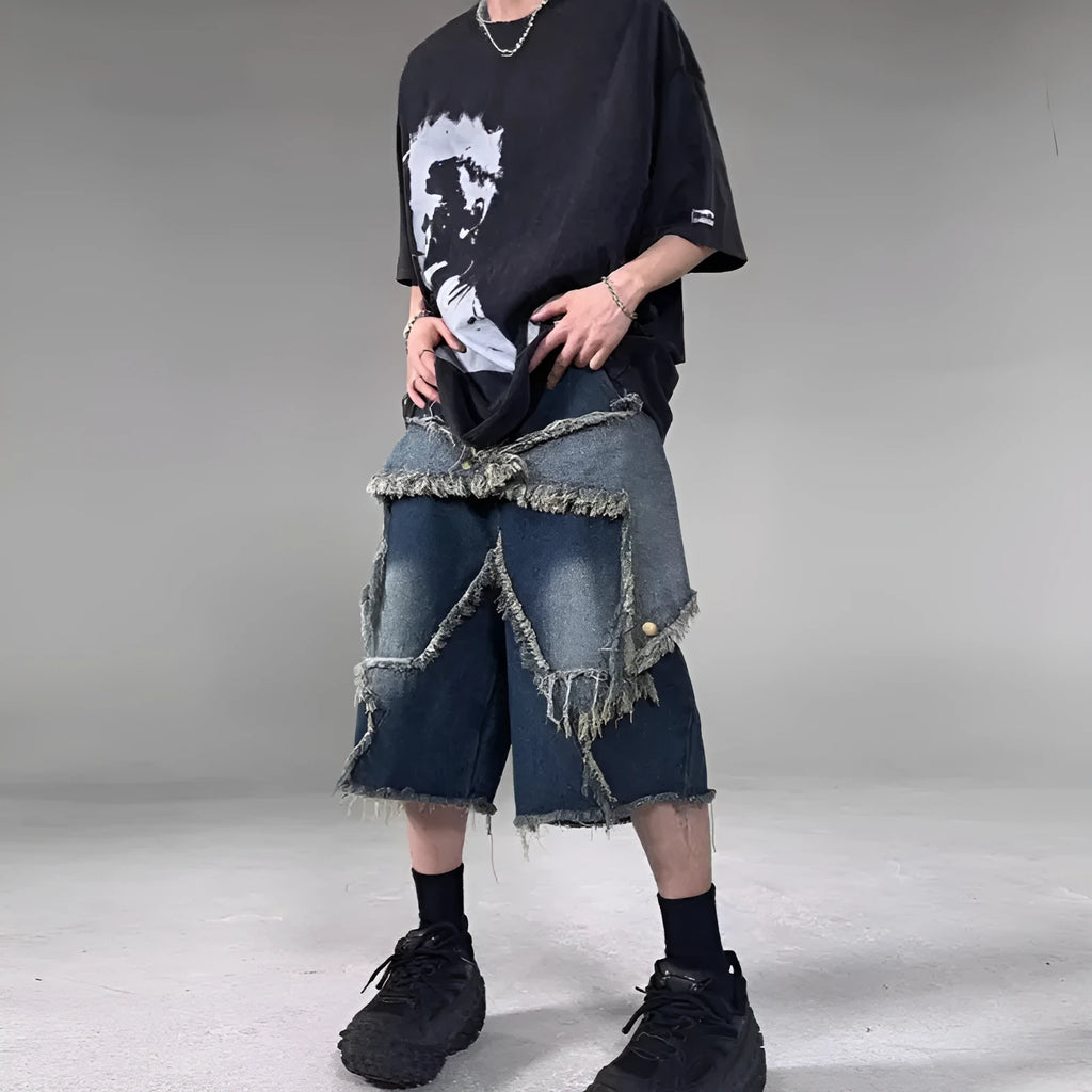 Blue denim shorts with frayed detailing and five-pointed star design in loose fit