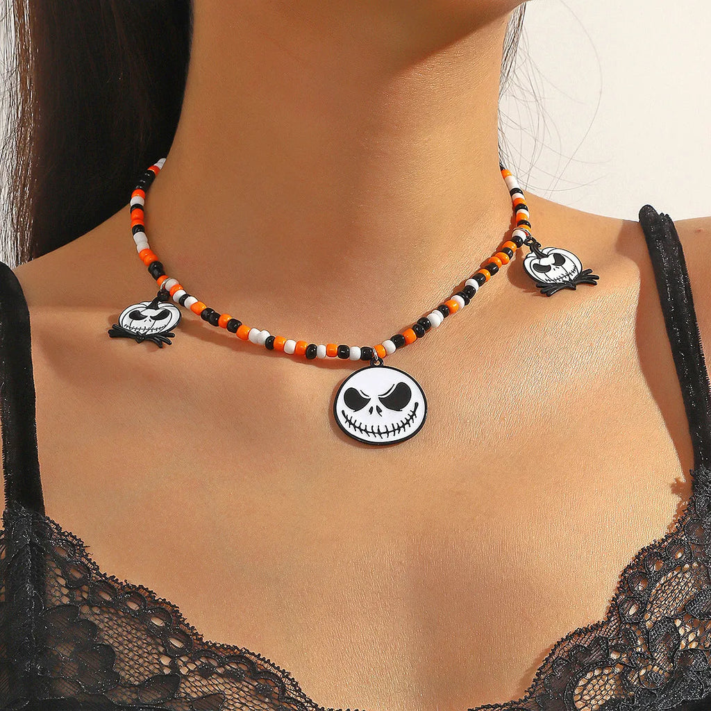 Halloween necklace with bat, ghost and skull pendants on bamboo chain