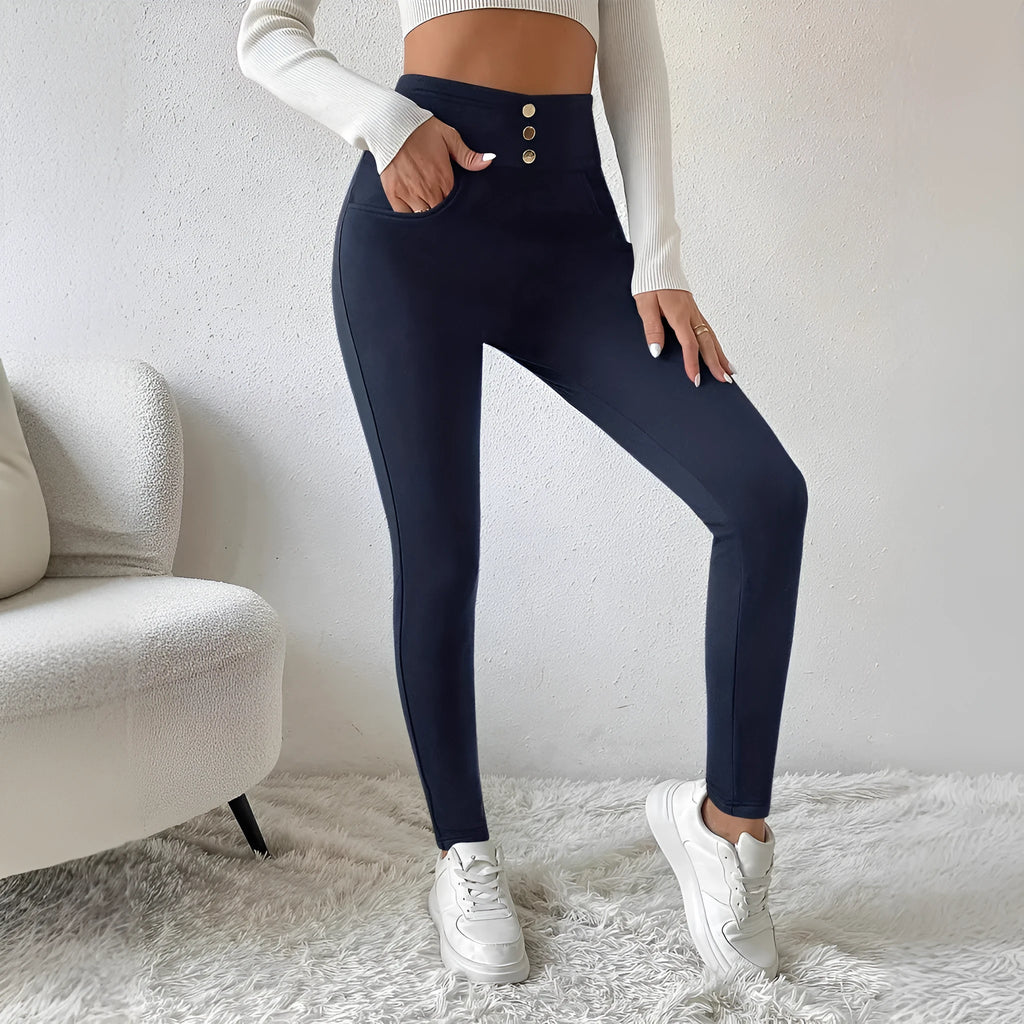 Women's navy blue high-waist slim trousers with straight-leg design on hanger