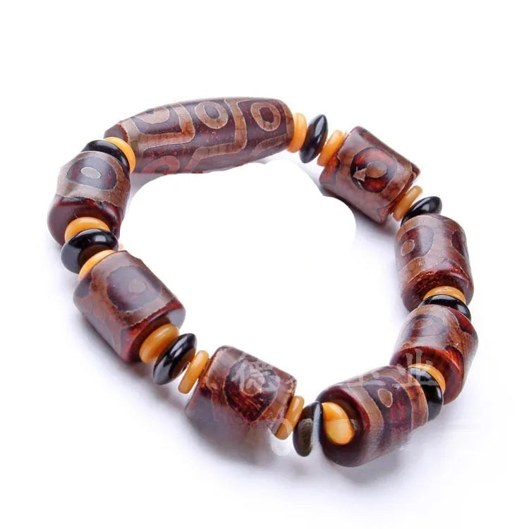 Agate Tibetan dzi bead bracelet with three-eye design and polished finish