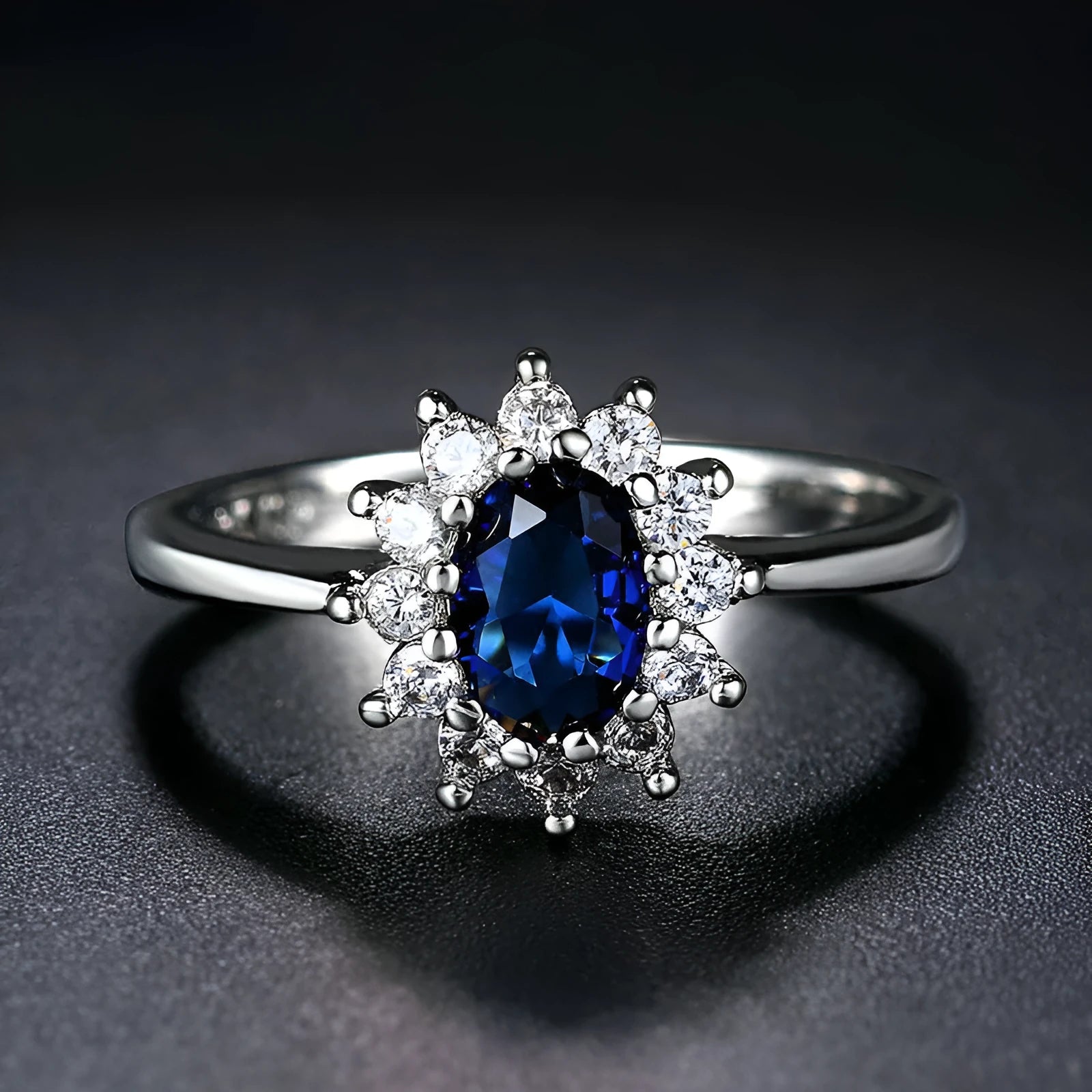 Women's blue moissanite ring with floral electroplated copper band and inlaid zirconium setting.