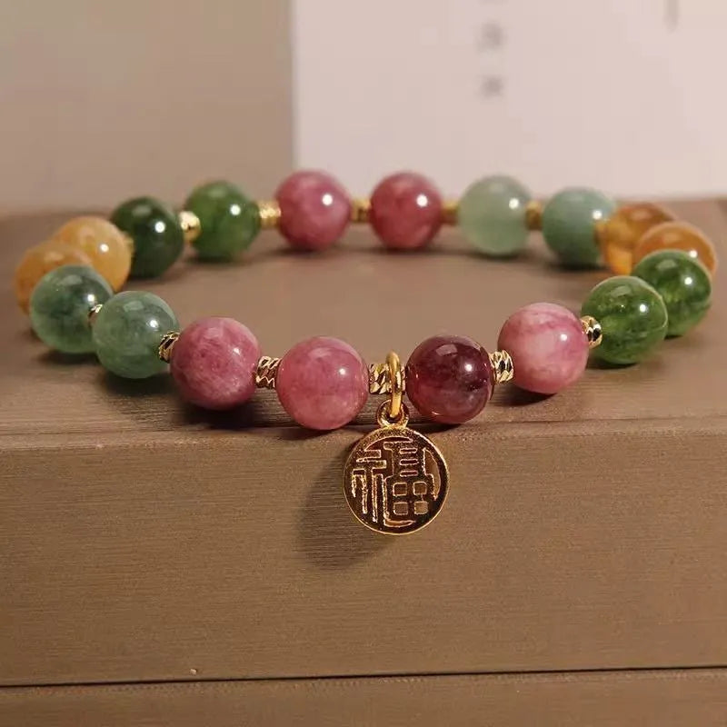 Natural colour tourmaline bracelet showing floral design option with electroplated silver finish