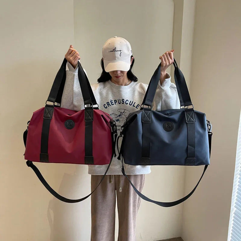 Waterproof Oxford cloth travel bag in solid colour with 36-55 litre capacity for short-distance trips