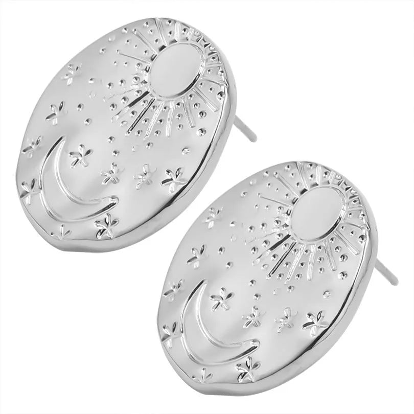A pair of geometric shell design stud earrings in stainless steel with a gold or silver electroplated finish.
