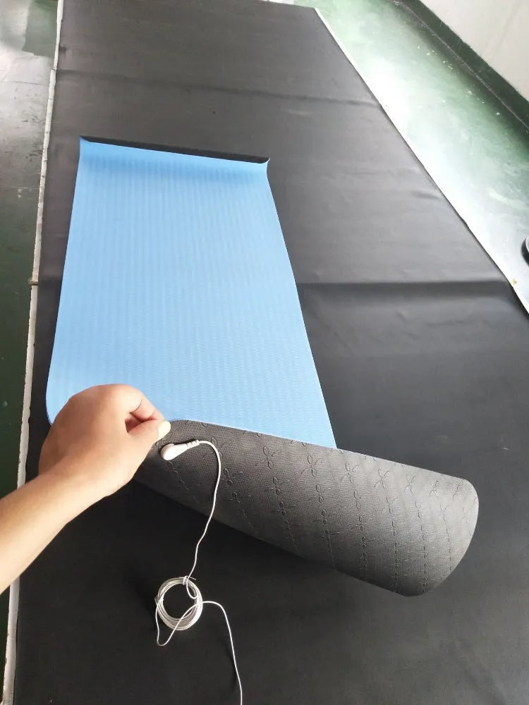 Blue conductive yoga mat with floral pattern, grounding wire, and non-slip PU leather surface