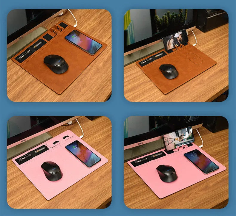 Large pink wireless charging mouse pad with integrated mobile phone holder on a desk.