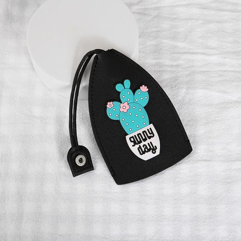 Cartoon pull-out key case in PU leather showing design options including resin fruit and big cartoon animal prints.