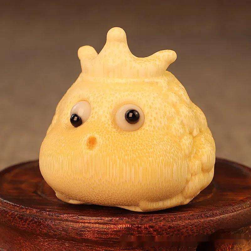 Solid bamboo carving of a Crown Princess toad ornament in cute style