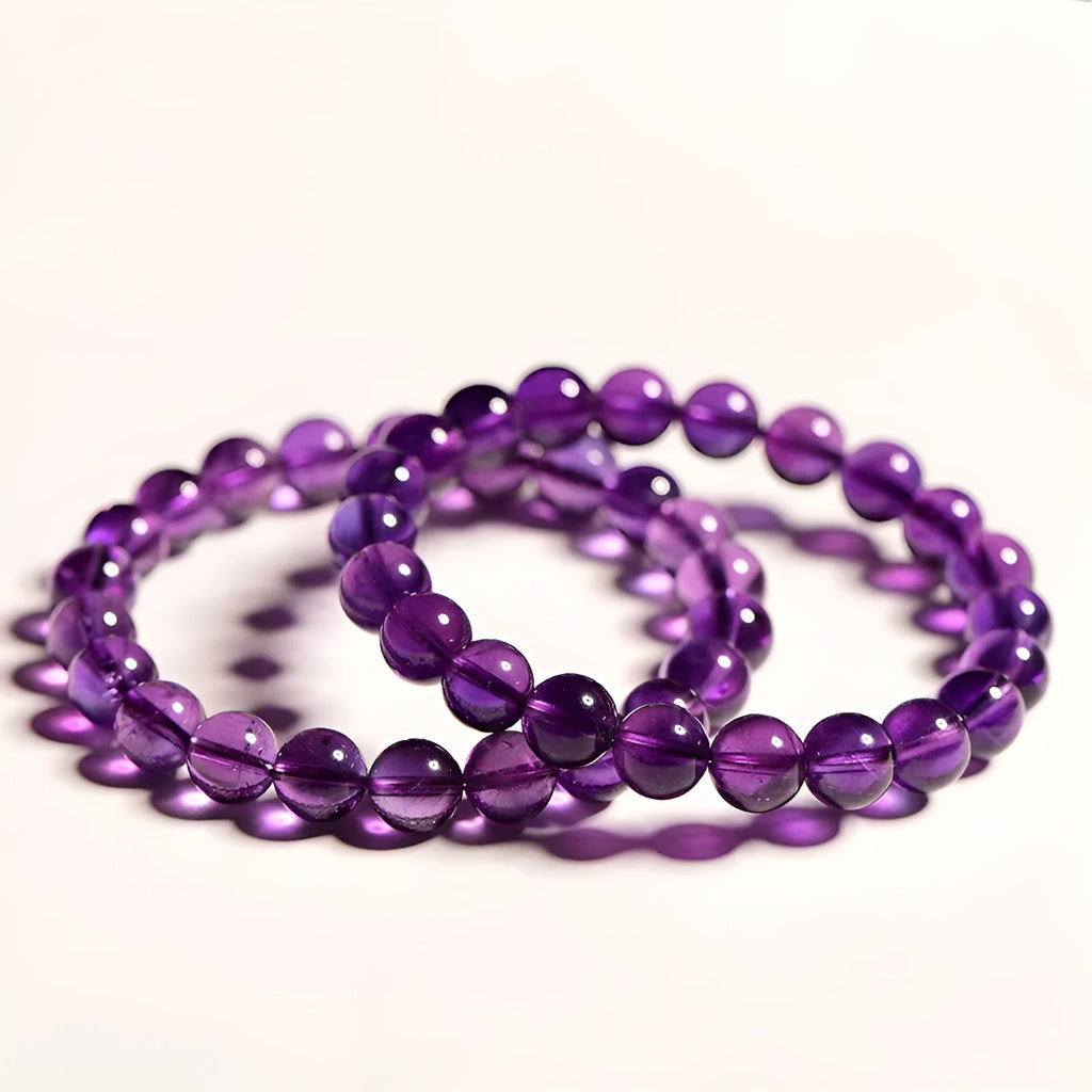 Natural amethyst bracelet with scattered Uruguay beads in selectable sizes and colour grades.