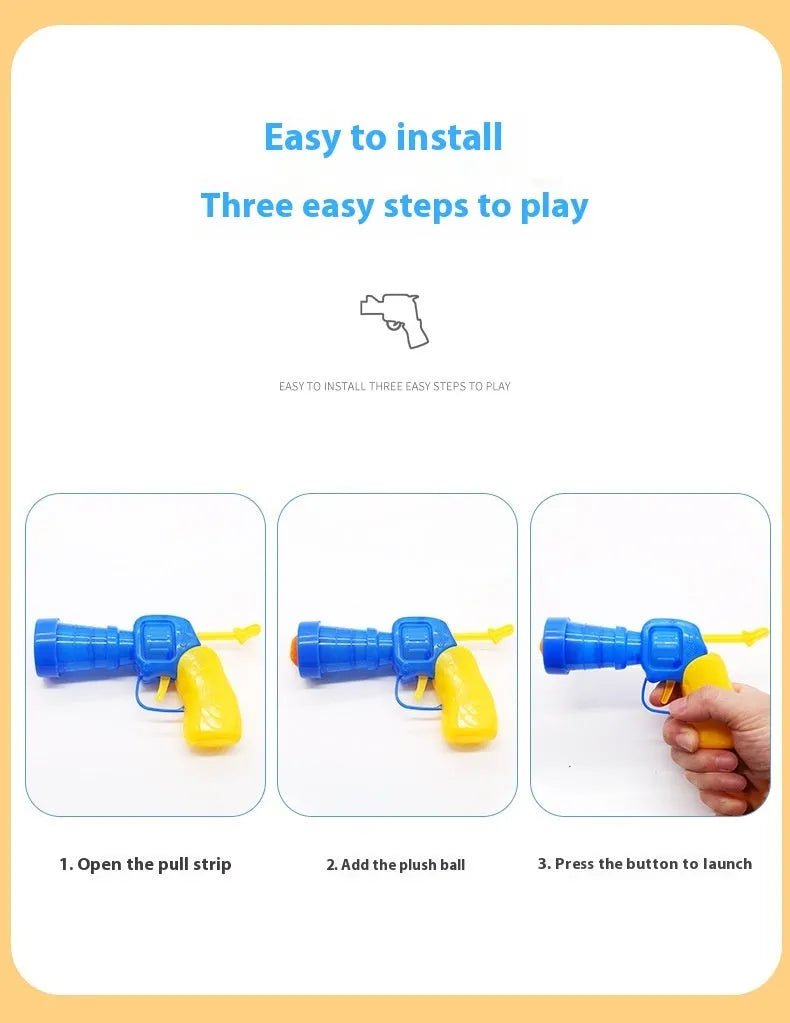 Plush ball launcher dog toy with soft pom-pom balls for indoor fetch games