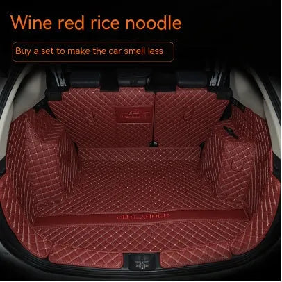 Mitsubishi Outlander custom boot liner with 3D raised edges and non-slip surface in a vehicle boot.