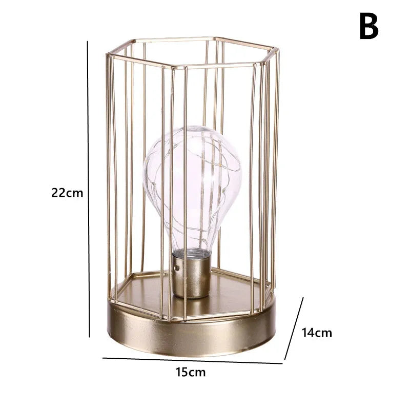 Geometric iron light bulb candle ornament with electroplated metallic finish, hanging as Nordic style home decor