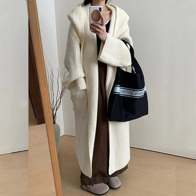 Loose fit women's hooded cardigan coat in soft acrylic fabric, shown in milky white.