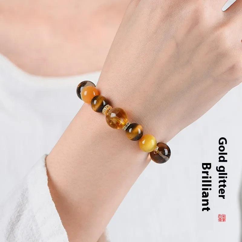 Women's natural yellow tower artificial crystal string beads bracelet with 10mm Jinba beads.