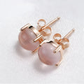 Rose gold drop shape synthetic quartz stud earrings with crystal inlay
