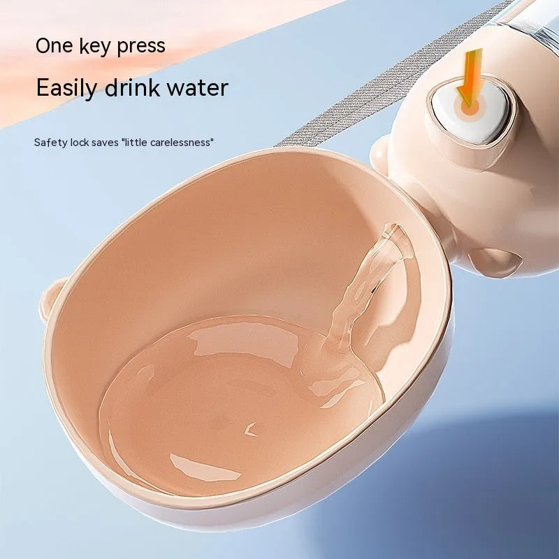 Portable dog water bottle and feeder bowl in brown, pink, or yellow colours for outdoor use