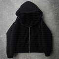 Casual baggy coat cardigan in black or white with long sleeves and loose fit