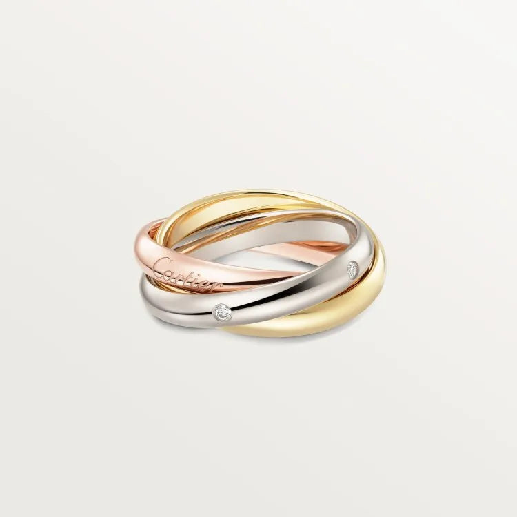 Silver couple rings showing full diamond setting and plain band options on a ring box.