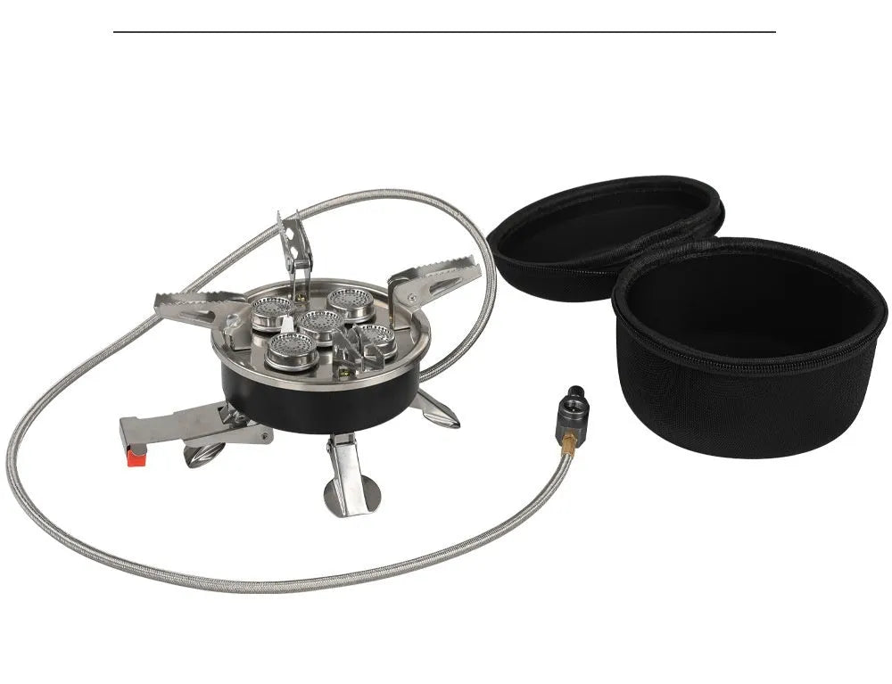 Silver coloured portable split stove made of stainless steel and copper with a long hose, shown folded for transport.