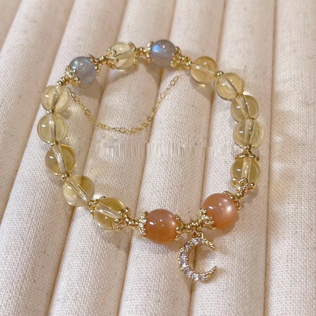 Chinese style crystal bracelet with 14K electroplated gilding and diamond-shaped citrine moon coloured elements