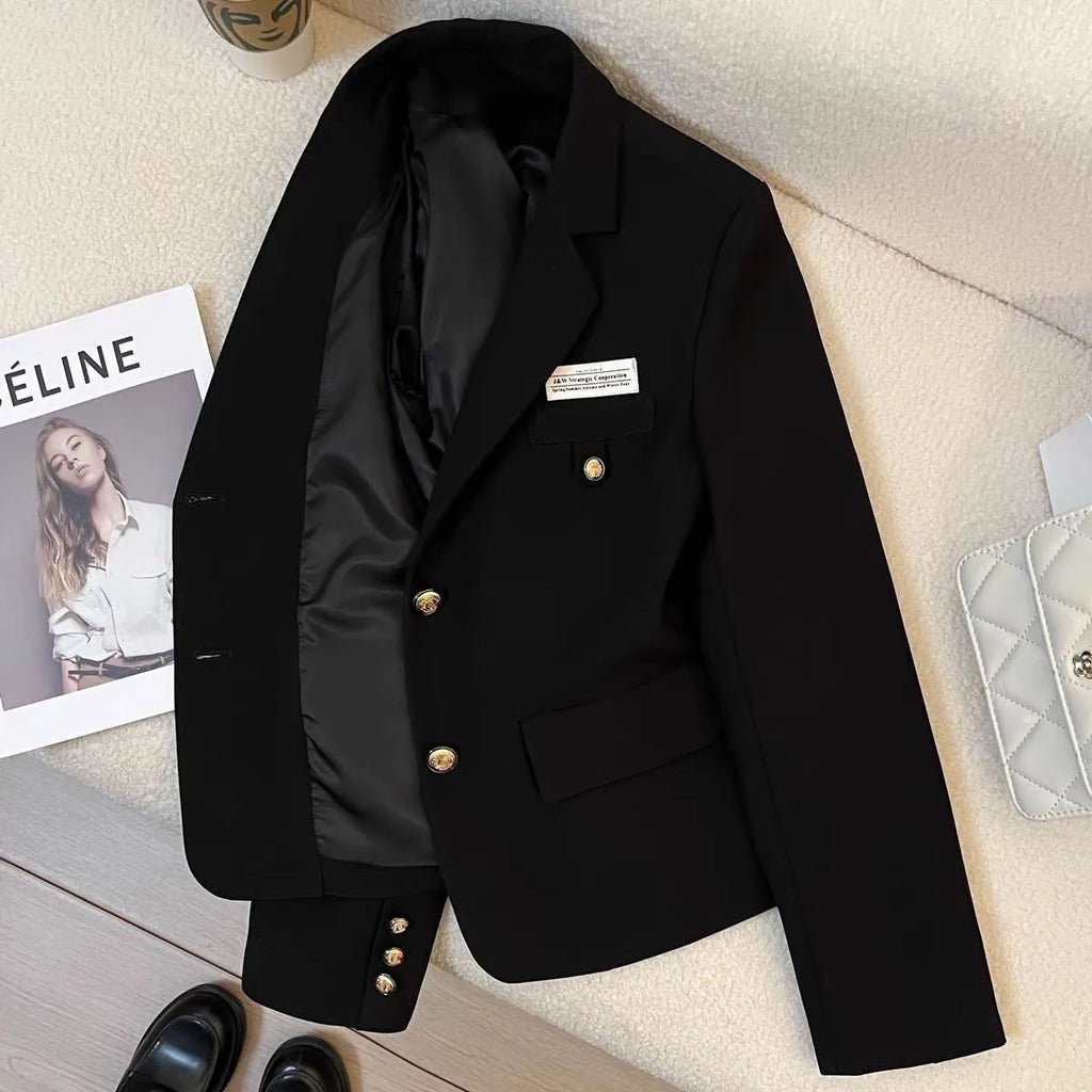 Women's black loose fit short suit coat with front pockets and regular long sleeves