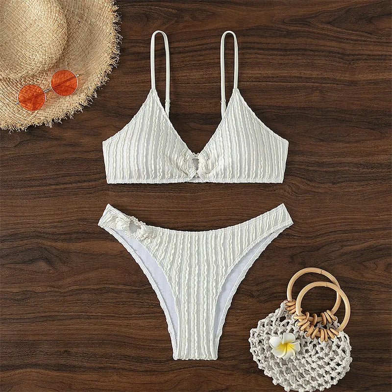 White women's V-neck sleeveless swimsuit with matching shorts for beach swimming