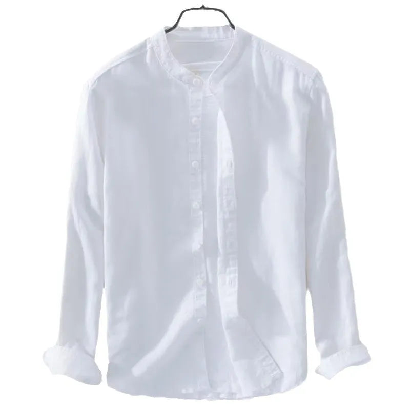 Man's loose fit long sleeve linen shirt in dark blue, showing button front and casual style.