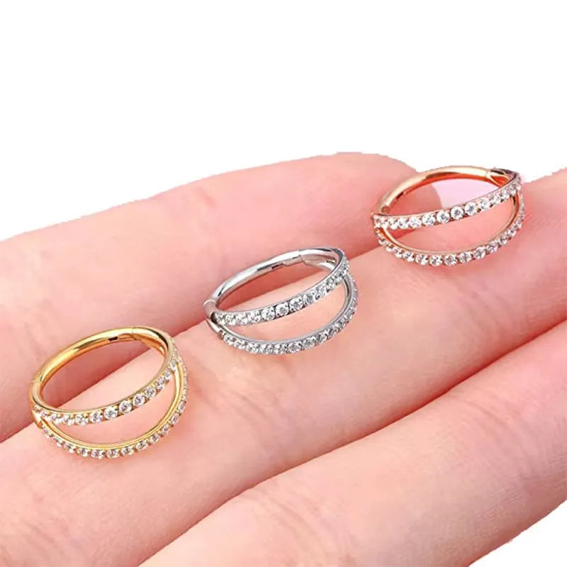 Titanium alloy nose ring in gold and steel colour finishes with size gauge options
