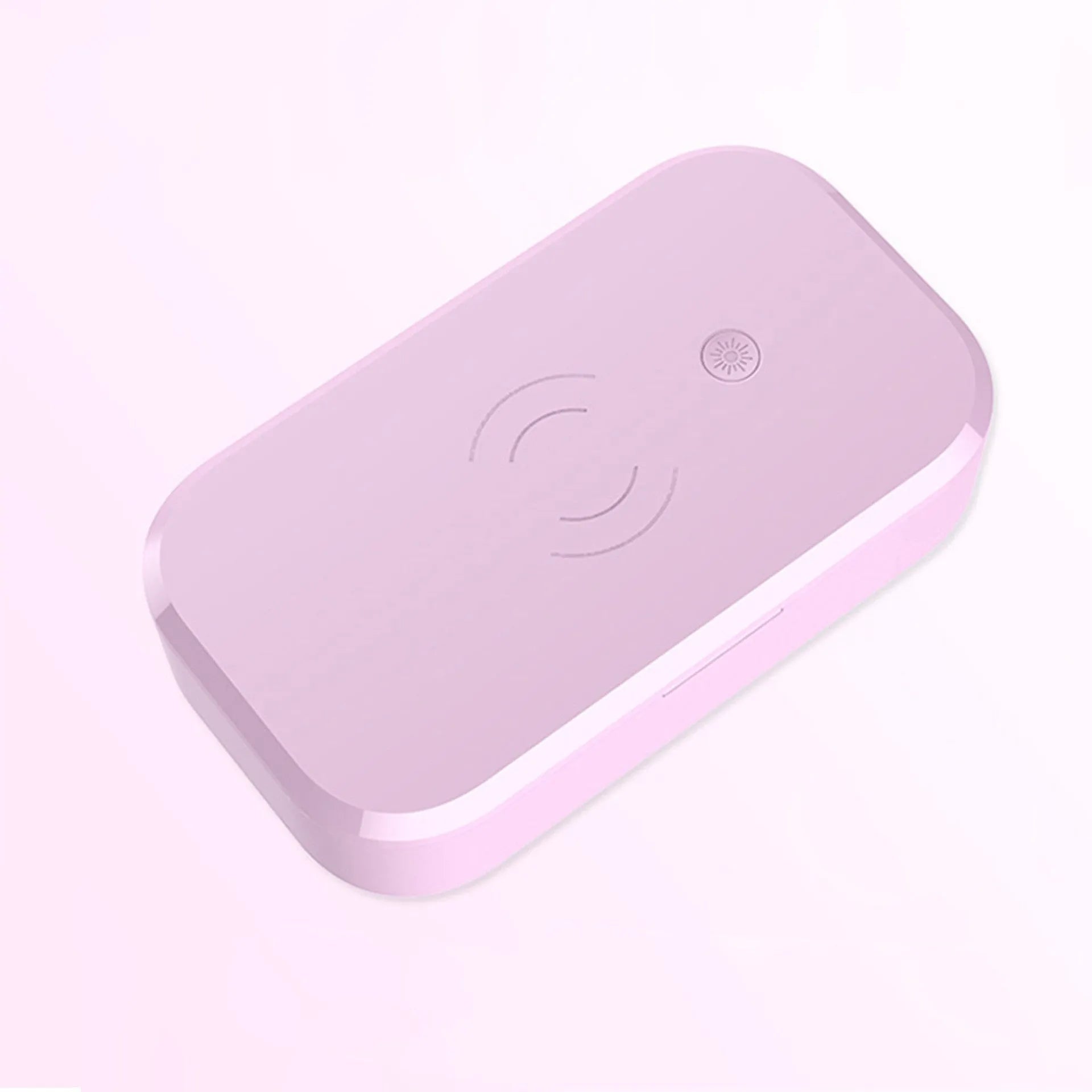 White ultraviolet disinfection box with wireless phone charging top and USB cable.
