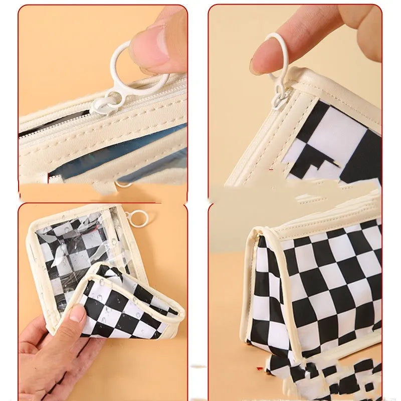 Transparent PVC pencil case with chessboard pattern showing pens inside, 21.5 cm length