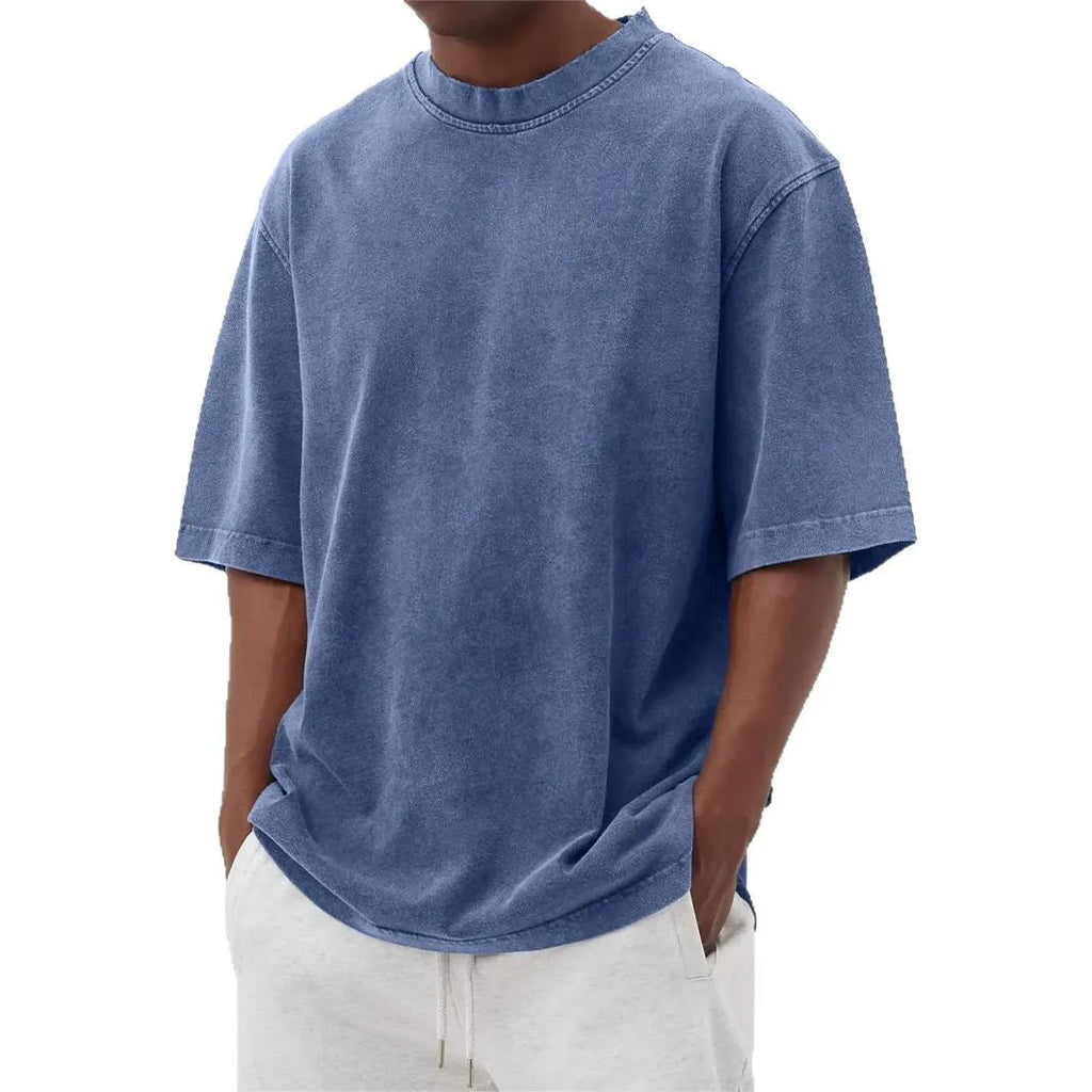 Men's loose fit distressed stone wash pullover t-shirt in solid colours like army green and blue.