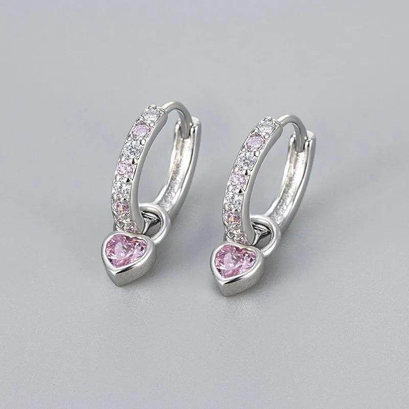 Women's copper earrings with heart-shaped drops and coloured stone accents in gold or white gold tone settings