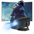 Black and white P330 portable mini projector with remote control on a table.