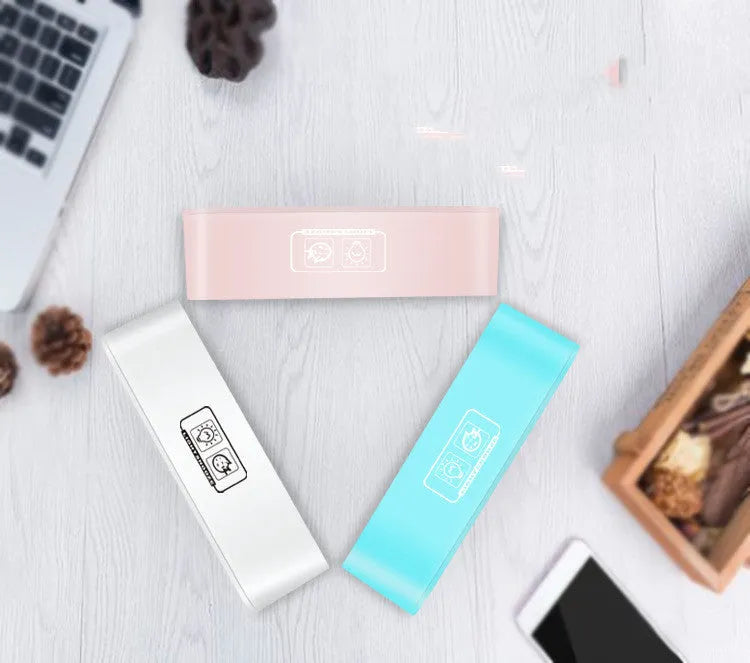 Blue rectangular LED atmosphere light alarm clock with digital display on quartz glass.