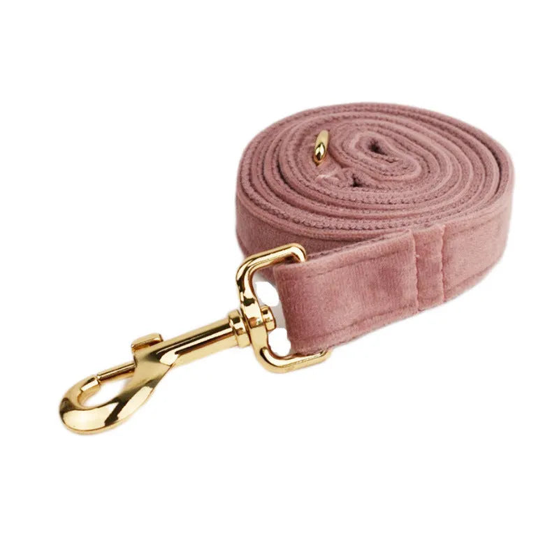 Light purple pink velvet dog collar and accessories set showing multiple pieces including collar, leash, bow tie, and vest