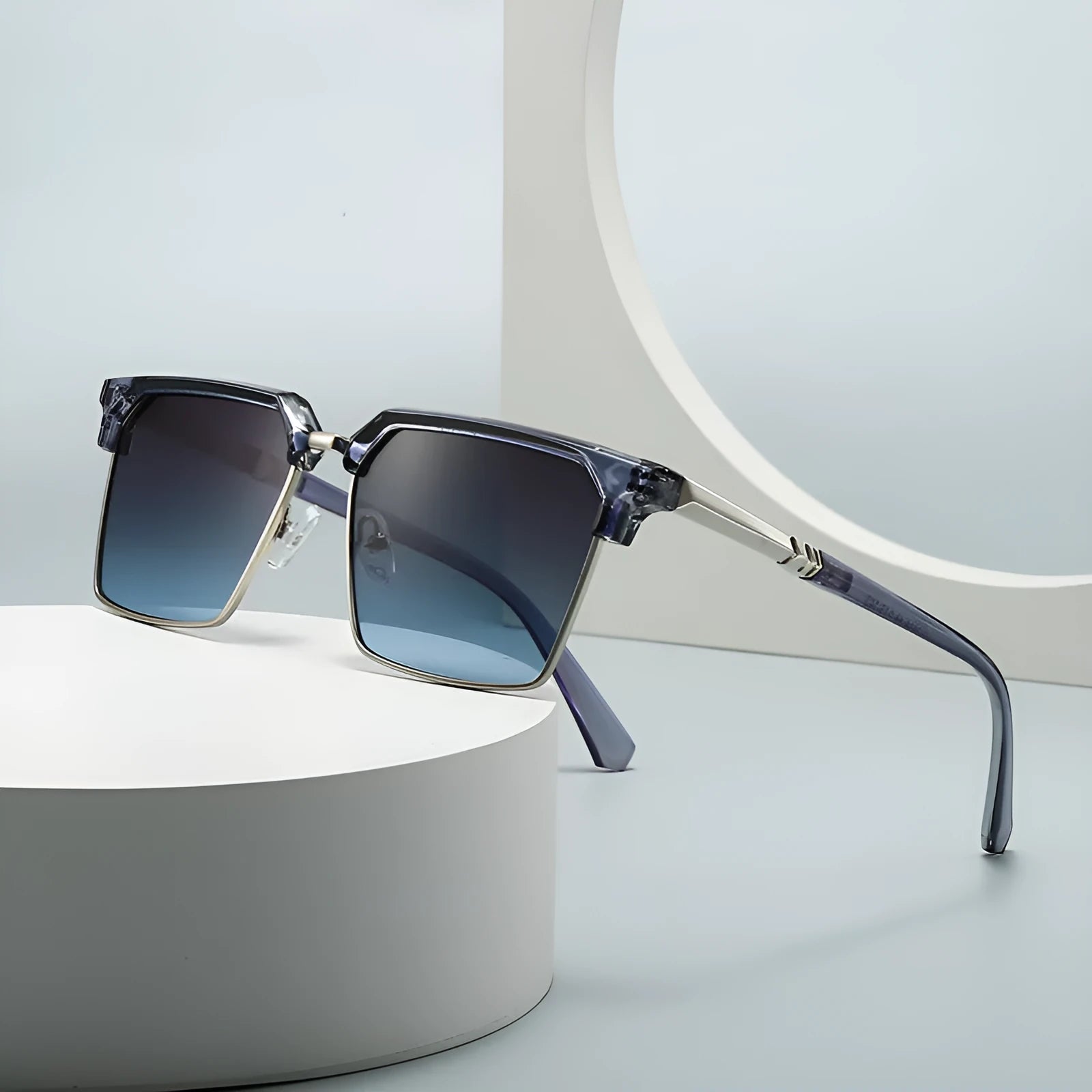 Men's square plastic sunglasses in box style showing multiple colour options on a grey background.