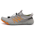Low-top striped training sneakers with a flat rubber sole, shown in various colours including black and grey orange.