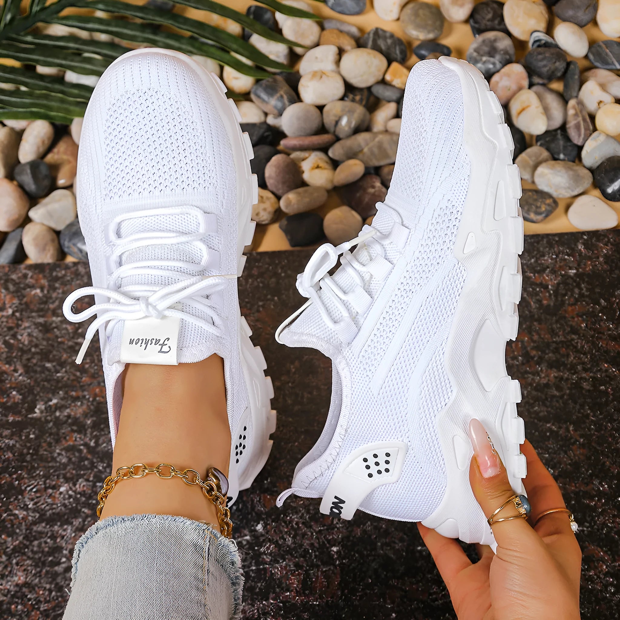 Women's low-top sneakers with mesh upper and platform sole in various colours.