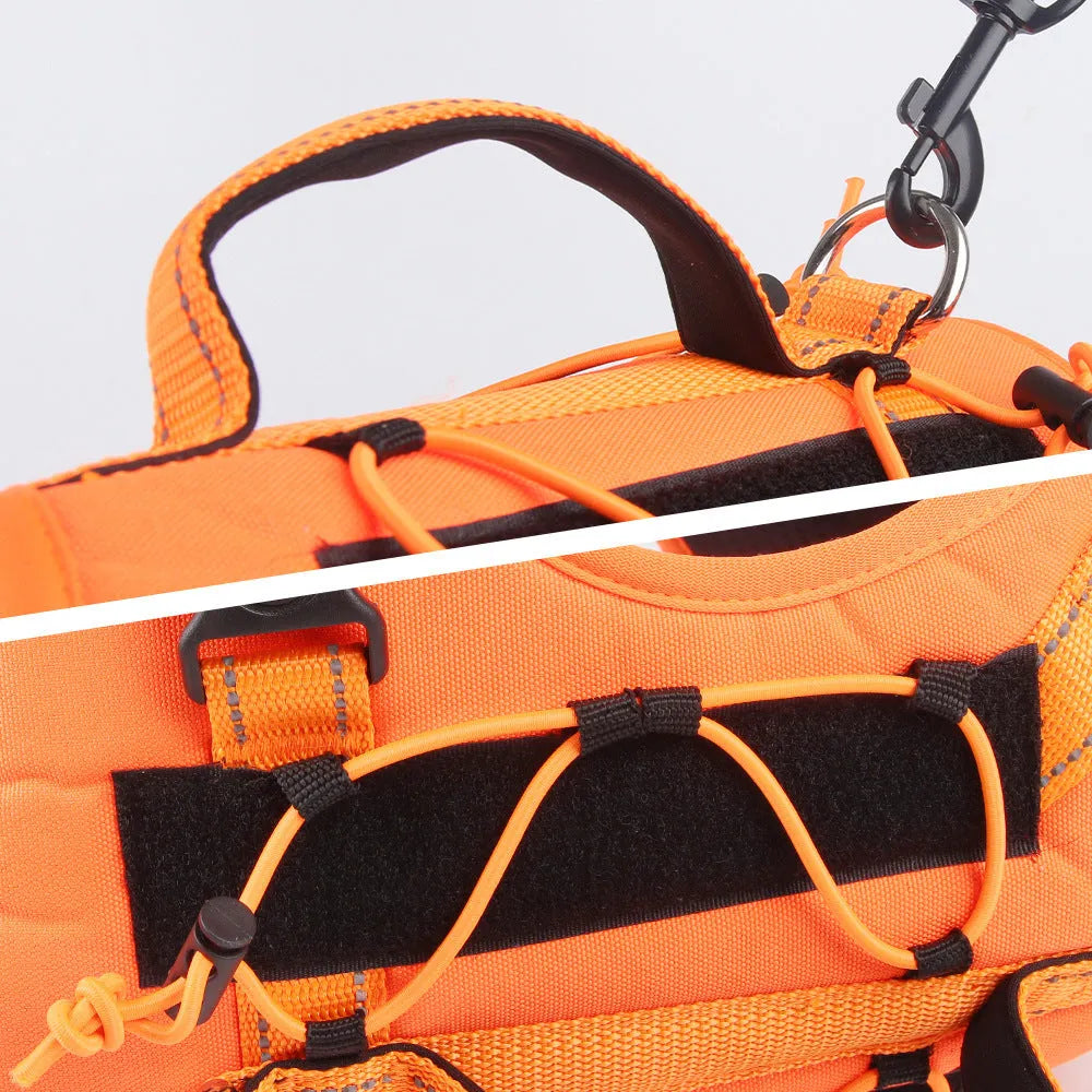 Orange reflective dog harness with explosion-proof breast strap and black hand-holding rope laid flat