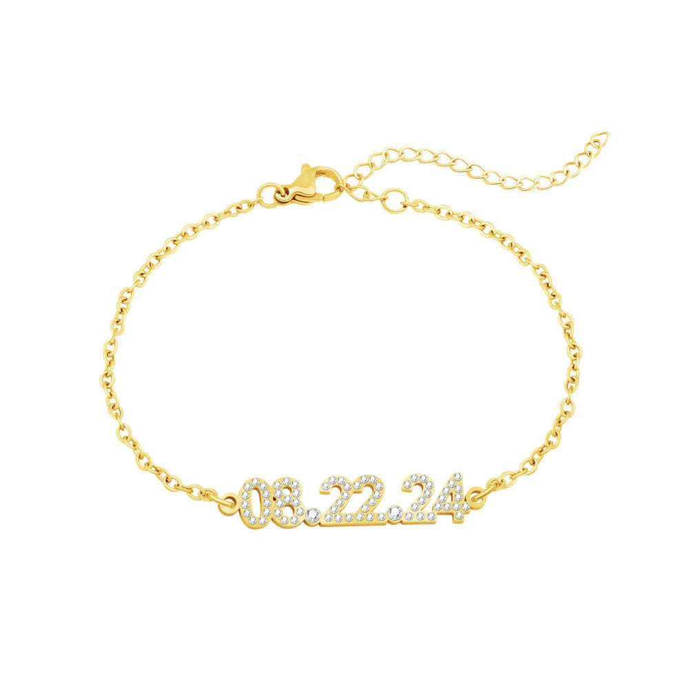 Stainless steel digital bracelet with diamond numerals on a metallic background.