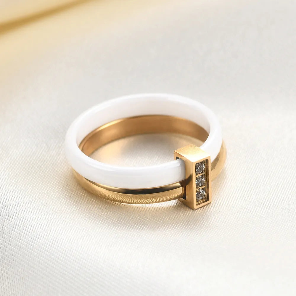 Women's ceramic geometric ring with zirconium inlay and glossy stitching in steel black finish