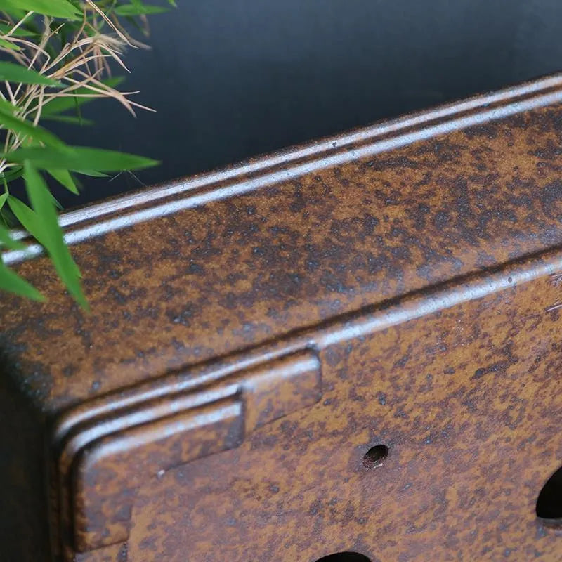 Rectangular purple sand bonsai flowerpot with firewood burning finish on wooden floor