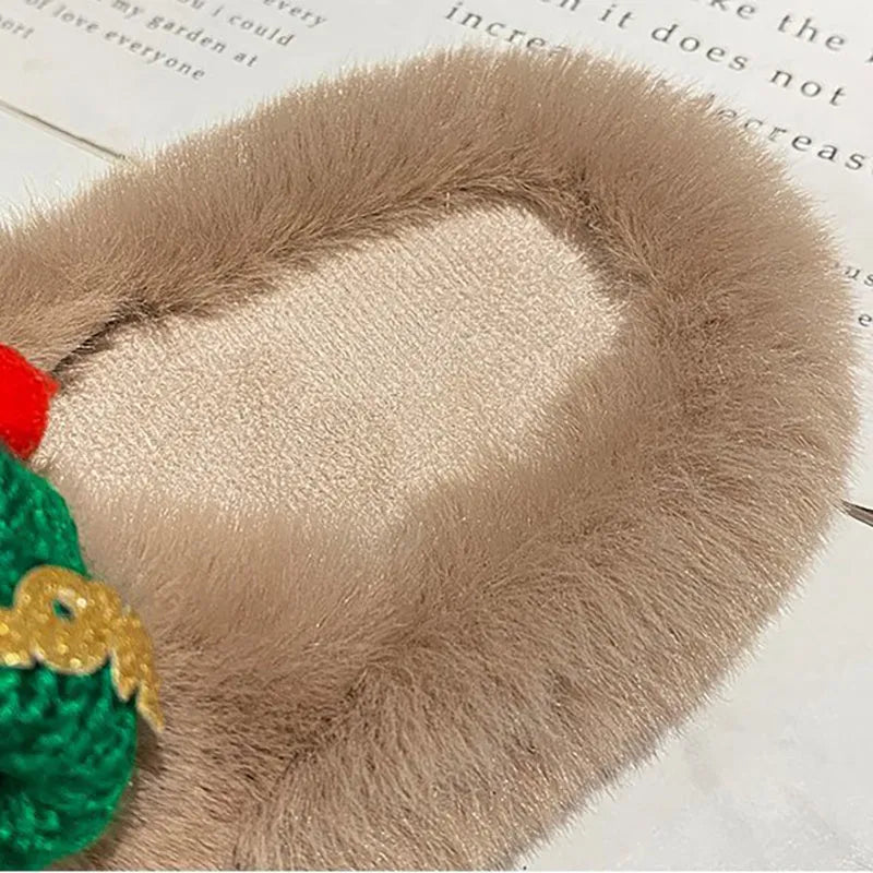 Women's faux plush slippers with a Christmas hat decoration on the upper, shown in available colours.