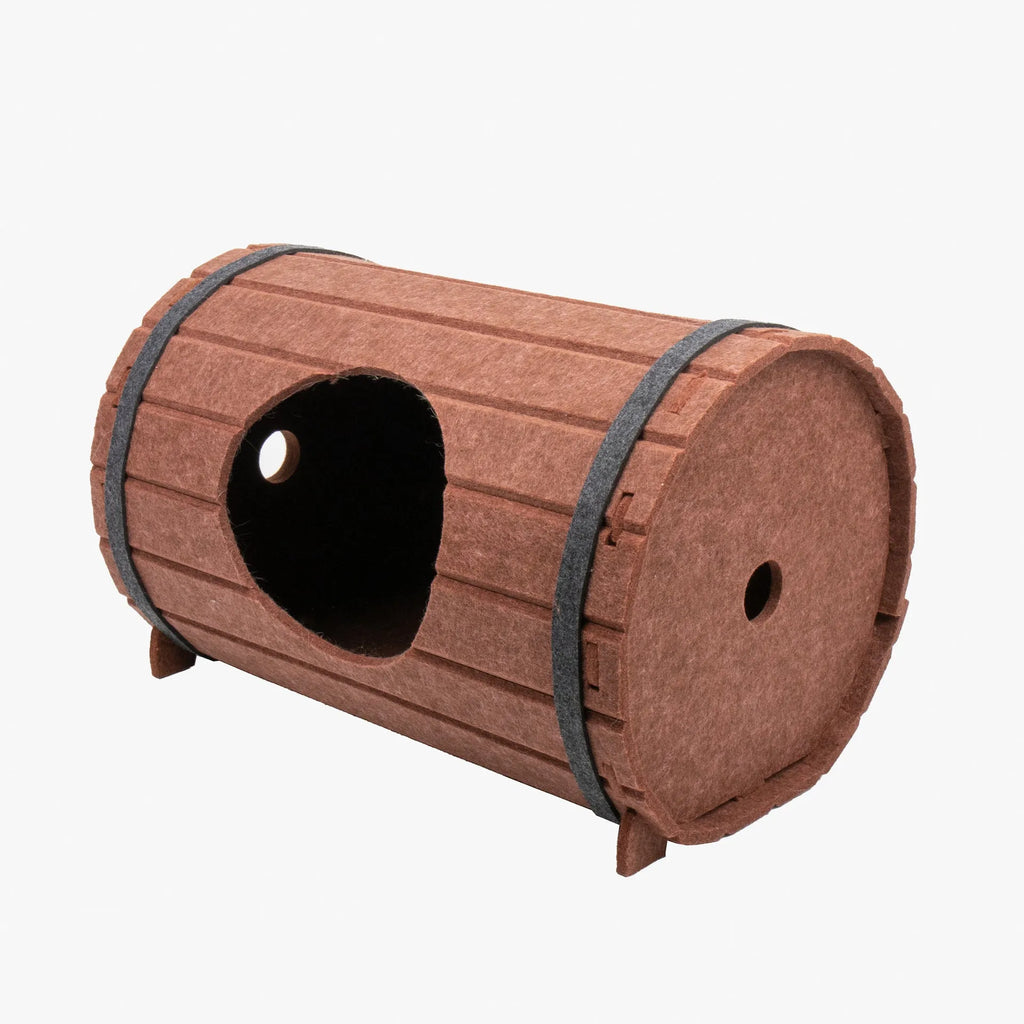 Assembled grey felt wine barrel-shaped pet bed for cats and small dogs.